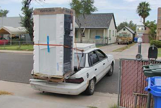 Overloaded Car with Freezer