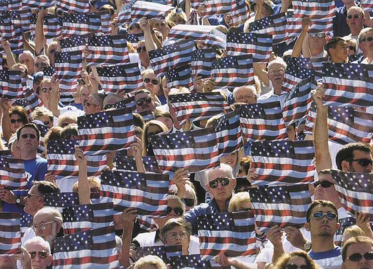 Univ of Kentucky fans wave flags