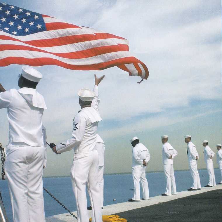 Lowering the flag on at sea